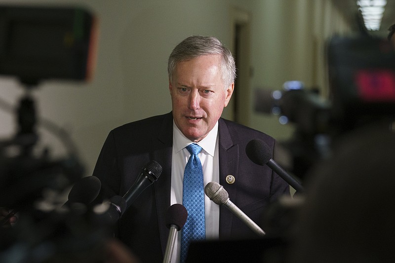 FILE - In this Oct. 25, 2018, file photo, Rep. Mark Meadows, R-N.C., speaks to media on Capitol Hill in Washington. Lawmakers clashed over science, ethics and politics Thursday, Dec. 13, at a House hearing on using fetal tissue in critically important medical research, as the Trump administration reviews the government’s ongoing support for such studies. “Most of my constituents don’t understand when you harvest baby parts, why that is OK,” said Meadows, who chaired the hearing by the Oversight & Government Reform committee. (AP Photo/Carolyn Kaster)