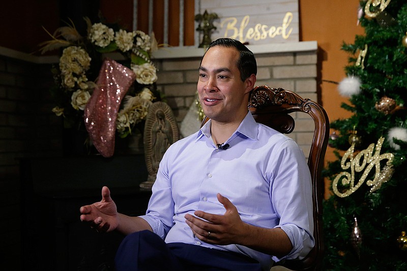 Democrat Julian Castro talks about exploring the possibility of running for president in 2020, at his home in San Antonio, Tuesday, Dec. 11, 2018.  The announcement Wednesday gives the 44-year-old Castro a jump-start on what's likely to be a crowded Democratic primary field that has no clear front-runner. He tells The Associated Press he plans to announce his ultimate decision in early January.  (AP Photo/Eric Gay)