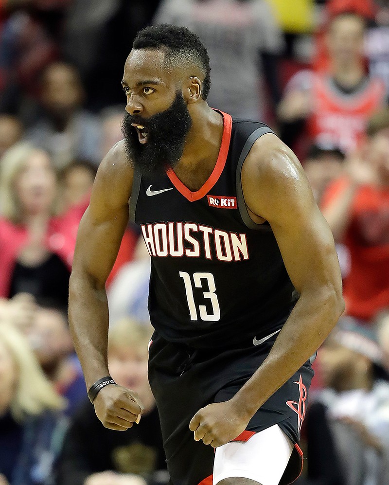 Houston Rockets' James Harden (13) reacts after dunking the ball against the Los Angeles Lakers during the first half of an NBA basketball game Thursday, Dec. 13, 2018, in Houston. (AP Photo/David J. Phillip)