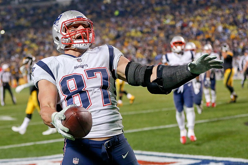 In this Dec. 17, 2017, file photo, New England Patriots tight end Rob Gronkowski (87) plays against the Pittsburgh Steelers, in an NFL football game, in Pittsburgh. The New England tight end has dominated the Steelers throughout his career, no matter how Pittsburgh opts to defend him. (AP Photo/Keith Srakocic, File)