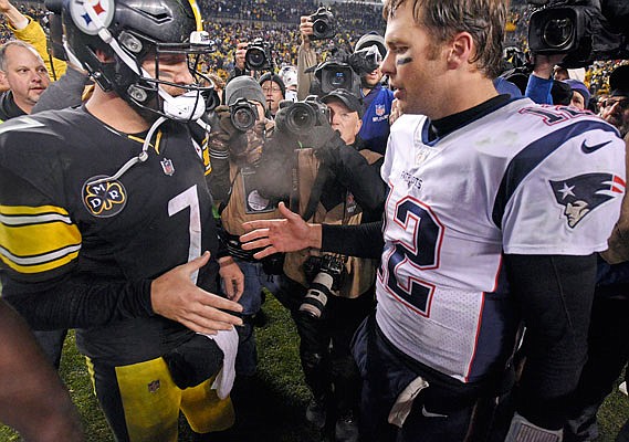 In this Dec. 17, 2017, file photo, Steelers quarterback Ben Roethlisberger and Patriots quarterback Tom Brady meet on the field following a game in Pittsburgh. The two will meet again Sunday in Pittsburgh as the Steelers host the Patriots.