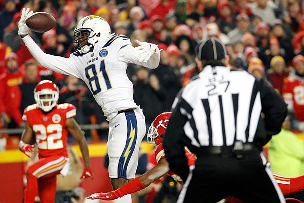 Chiefs cornerback Kendall Fuller (lower middle) is called for pass interference against Chargers wide receiver Mike Williams in the final minute of Thursday night's game at Arrowhead Stadium.