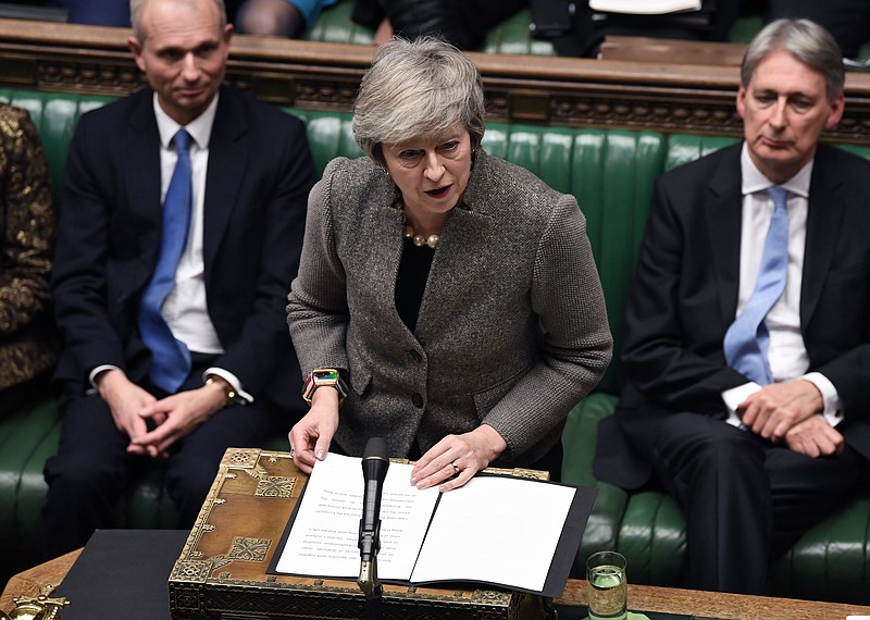 In this photo provided by the UK Parliament, Britain's Prime Minister Theresa May delivers a speech in the House of Commons in London, Monday, Dec. 17, 2018. Prime Minister Theresa May said Monday that the postponed vote in Parliament on Britain's Brexit agreement with the European Union will be held the week of Jan. 14 — more than a month after it was originally scheduled and just 10 weeks before Britain leaves the EU. (Jessica Taylor/UK Parliament via AP)