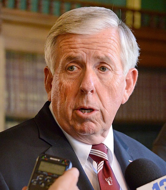 Gov. Mike Parson speaks to reporters July 11, 2018, at the Governor's Mansion.