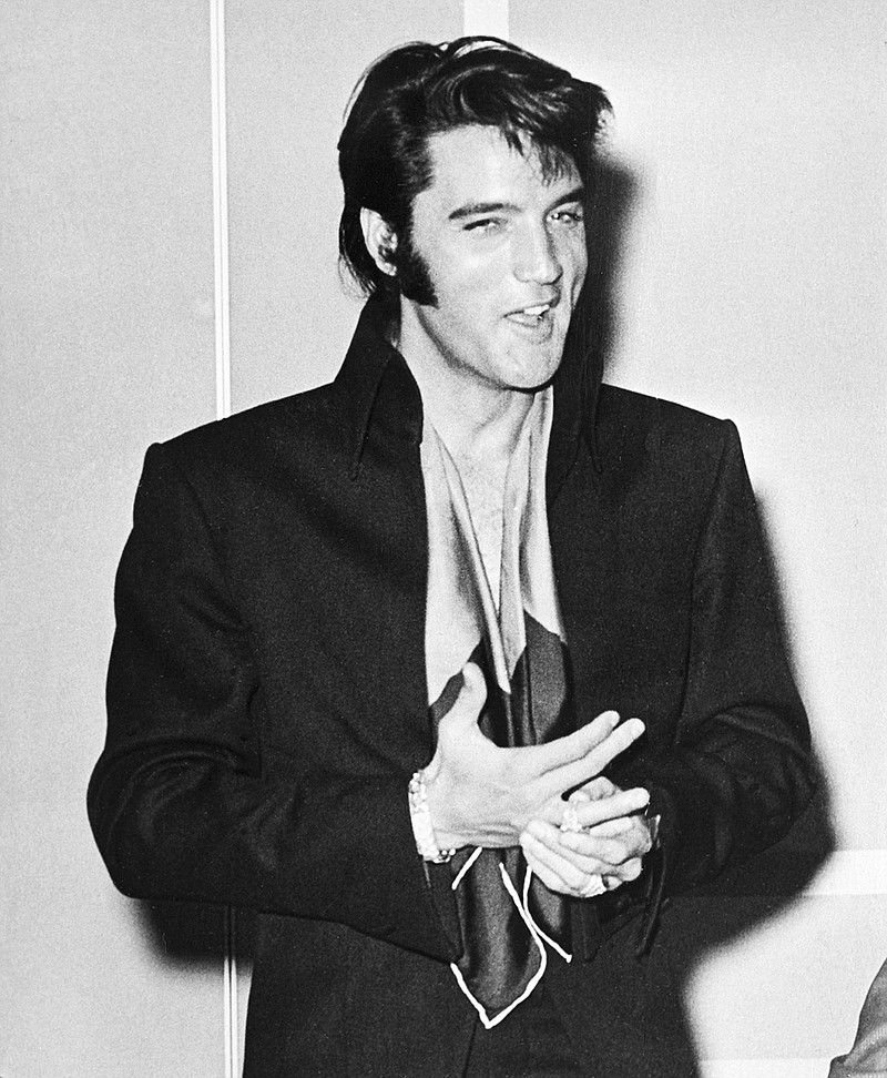 FILE - In this Aug. 1969 file photo, Elvis Presley is shown at the International Hotel where he made his first public stage appearance in 9 years in Las Vegas. The 1968 television show known as Presley's comeback special is experiencing its own return and revitalization. NBC has said the "Elvis All-Star Tribute" will be hosted by Blake Shelton in Feb. 2019, and will include well-known performers recreating the songs and staging of the original program. (AP Photo, File)