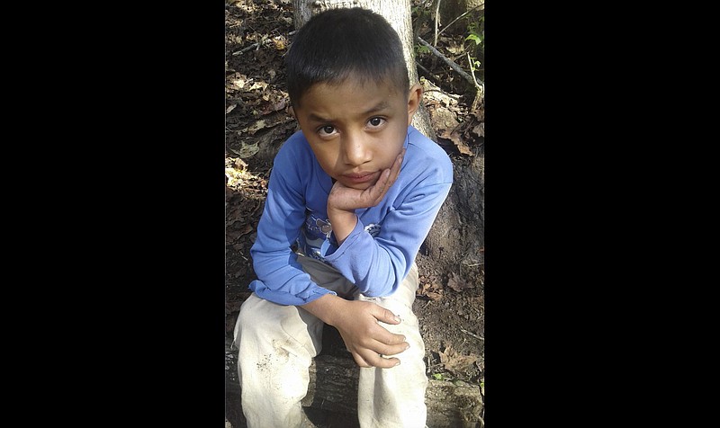 This Dec, 12, 2018 photo provided by Catarina Gomez on Thursday, Dec. 27, 2018, shows her half-brother Felipe Gomez Alonzo, 8, near her home in Yalambojoch, Guatemala. The 8-year-old boy died in U.S. custody at a New Mexico hospital on Christmas Eve after suffering a cough, vomiting and fever, authorities said. The cause is under investigation. (Catarina Gomez via AP)