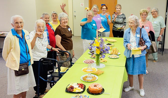 Spring Tea is celebrated by Callaway County Family and Community Education District leaders.