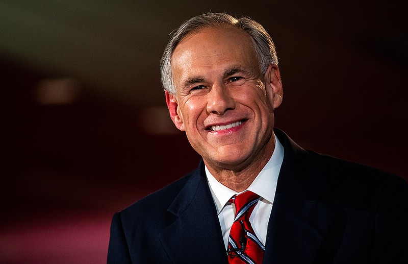 In this Sept. 28, 2018 file photo, Texas Governor Greg Abbott smiles before a gubernatorial debate against his Democratic challenger Lupe Valdez at the LBJ Library in Austin, Texas.  Decisions about health care and education will top the agenda in many state capitols as lawmakers convene in new sessions in 2019.  Abbott and the Republican-controlled Legislature will be wrestling with whether to tap as much as $5 billion from the state's rainy-day fund to pay for the recovery from Hurricane Harvey, which swamped the southeast portion of the state in August 2017.  (Nick Wagner/Austin American-Statesman via AP, Pool)