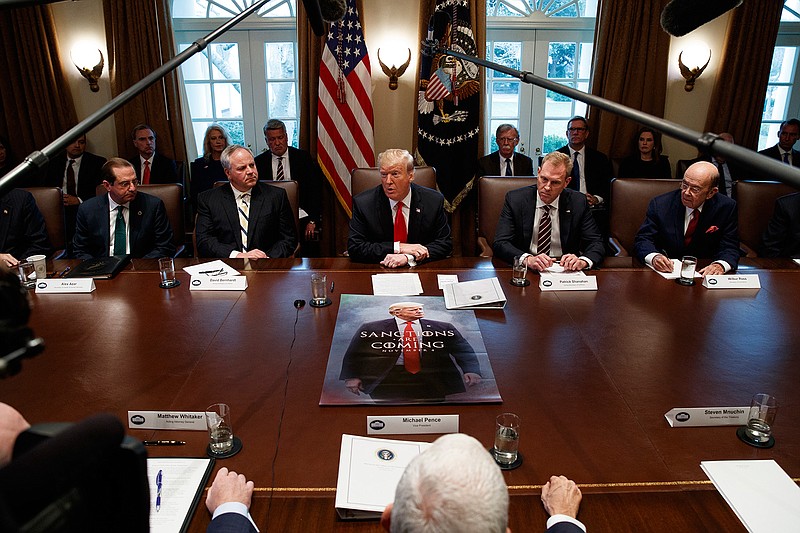President Donald Trump speaks during a cabinet meeting at the White House, Wednesday, Jan. 2, 2019, in Washington. From left, Secretary of Health and Human Services Alex Azar, acting Secretary of the Interior David Bernhardt, Trump, acting Secretary of Defense Patrick Shanahan, and Secretary of Commerce Wilbur Ross. (AP Photo/Evan Vucci)