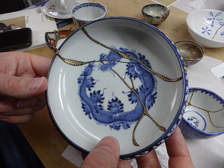 This Nov. 11, 2018 photo shows an example of Kintsugi at the Kuge Crafts workshop in Tokyo. Kintsugi is an ancient Japanese method of repairing broken pottery with gold that creates a new work of art. (Linda Lombardi via AP)