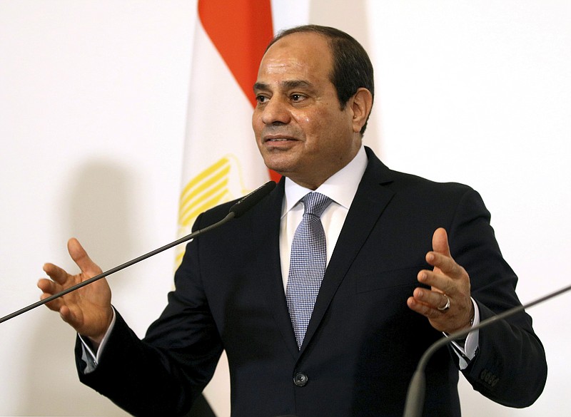 FILE - In this Dec. 17, 2018, file photo, Egyptian President Abdel-Fattah el-Sissi addresses the media during a joint press conference at the federal chancellery in Vienna, Austria. U.S. television network CBS says el-Sissi told it in an interview that his country and Israel, with whom it fought four wars, are cooperating against Islamic militants in the Sinai Peninsula. (AP Photo/Ronald Zak, File)