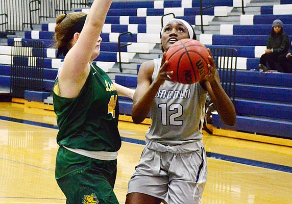 Bre Coleman of Lincoln looks to shoot during Saturday afternoon's game against Missouri Southern at Jason Gym.