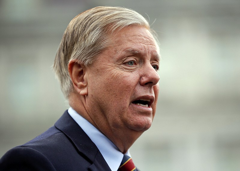 FILE - In this Dec. 30, 2018, file photo, Sen. Lindsey Graham, R-S.C., speaks to members of the media outside the West Wing of the White House in Washington, after his meeting with President Donald Trump. Republicans and Democrats on the Senate Judiciary Committee are renewing their attempt to protect special counsel Robert Mueller’s job, sending a signal to Trump as he keeps up his criticism of Mueller’s Russia investigation. The legislation, sponsored by incoming Senate Judiciary Committee Chairman Graham, and three other members, is expected to be introduced this week.  (AP Photo/Pablo Martinez Monsivais, File)