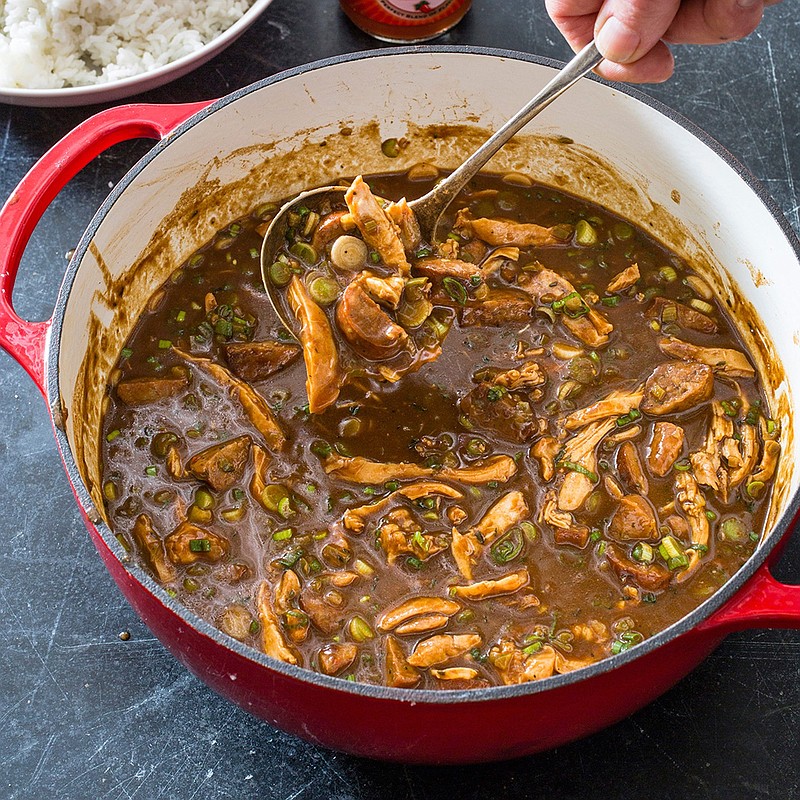 This undated photo provided by America's Test Kitchen in December 2018 shows Chicken and Sausage Gumbo in Brookline, Mass. This recipe appears in the cookbook "Dutch Oven." (Carl Tremblay/America's Test Kitchen via AP)