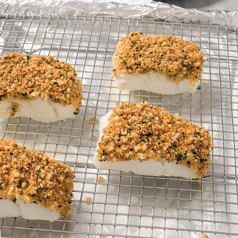 This undated photo provided by America's Test Kitchen in December 2018 shows Crispy Baked Cod in Brookline, Mass. This recipe appears in the "Complete Cookbook for Young Chefs." (Carl Tremblay/America's Test Kitchen via AP)