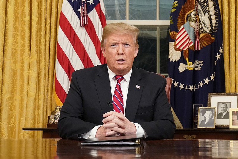 President Donald Trump speaks from the Oval Office of the White House as he gives a prime-time address about border security Tuesday, Jan. 8, 2018, in Washington. (Carlos Barria/Pool Photo via AP)