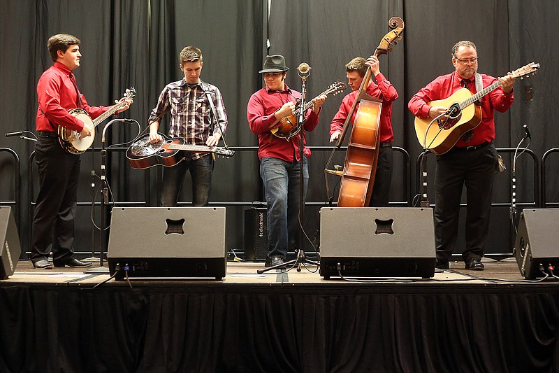 <p>News Tribune file photo</p><p>Bull Harman and Bull’s Eye plays at the Capitol Plaza Hotel and Convention Center during the 43rd annual Bluegrass Music Awards and 34th Mid-West Convention in Jefferson City two years ago. His band is nominated for Instrumental Group of the Year and Bluegrass Band of the Year (overall), as well as Bull Harman is nominated for Entertainer of the Year and will serve a co-master of ceremonies with Gilbert Humphrey during this year’s awards and convention Friday and Saturday at Capitol Plaza.</p>