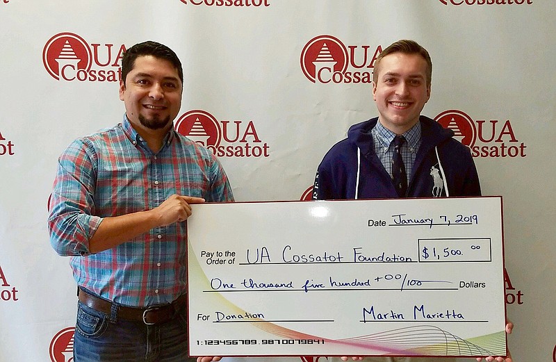 Martin Marietta recently donated $1,500 to fund an industrial maintenance scholarship at the University of Arkansas Cossatot. Shown are, from left, Martin Marietta Plant Manager Salomon Hernandez and UA Cossatot Coordinator of Development Dustin Roberts. (Submitted photo)