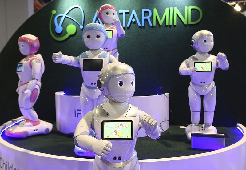 AvatarMind has developed service robots like iPal which is based on artificial intelligence, motion control, sensors and power management, and created iPal to deliver on that vision with multiple applications for friendly, fun and functional robot assistants, shown at CES International Tuesday, Jan. 8, 2019, in Las Vegas. Designed for child education and elder care, iPal is a fully functional humanoid robot with a friendly, playful demeanor, as iPal runs on the Android operating system with extensions for motion, sensor and natural language conversation. (AP Photo/Ross D. Franklin)