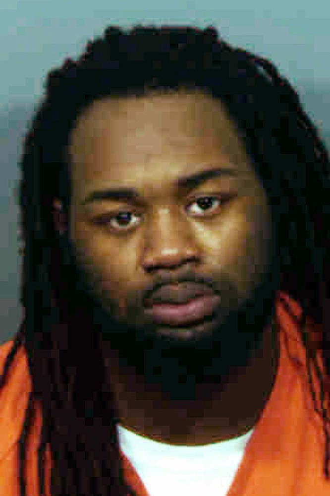 FILE - This undated file photo provided by the state's attorney's office in Prince George's County, Md., shows Malik Ford. His brother, Michael Ford, is charged with attacking a Maryland police station while his two brothers videotaped the shootout, which led to an officer mistakenly killing an undercover detective. Michael Ford faces a prison sentence for his conviction on a murder charge in the friendly-fire killing. He is scheduled to be sentenced by a Prince George’s County judge on Thursday, Jan. 10, 2019.  (Prince George's County State's Attorney's Office via AP)
