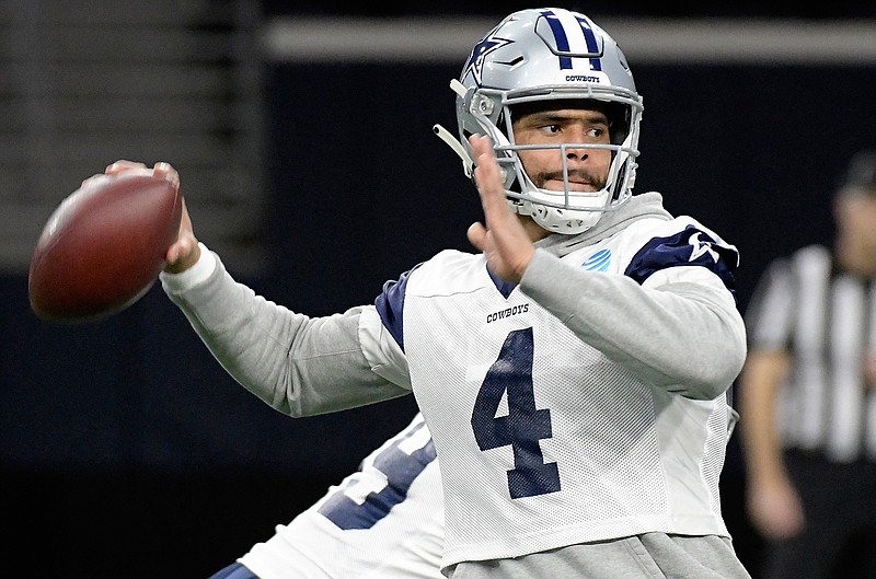 Dallas Cowboys quarterback Dak Prescott (4) drops back to pass during practice, Thursday, Jan. 10, 2018 in Frisco, Texas. The Dallas Cowboys play the Los Angeles Rams on Saturday. (Max Faulker/Star-Telegram via AP)