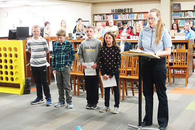 Bartley Elementary fifth-grade students William Yates, left, Ryne Shadbolt, Nate Buckwalter and Cheyenne Merritt presented on their research into school lunches at Wednesday's Fulton Public Schools Board of Education meeting. Their teacher Jess Wright said working on open-ended projects helps students learn and develop problem-solving skills.