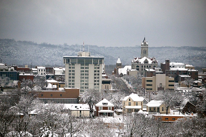 
Several inches of snow is seen covering multiple businesses and homes Saturday, January 12, 2019, throughout downtown Jefferson City. 