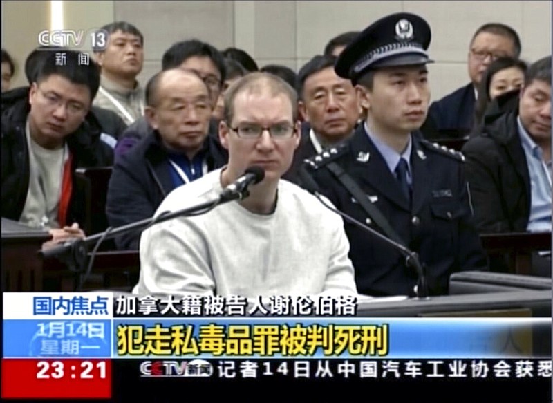 In this image taken from a video footage run by China's CCTV, Canadian Robert Lloyd Schellenberg attends his retrial at the Dalian Intermediate People's Court in Dalian, northeastern China's Liaoning province on Monday, Jan. 14, 2019. A Chinese court sentenced the Canadian man to death Monday in a sudden retrial in a drug smuggling case that is likely to escalate tensions between the countries over the arrest of a top Chinese technology executive.