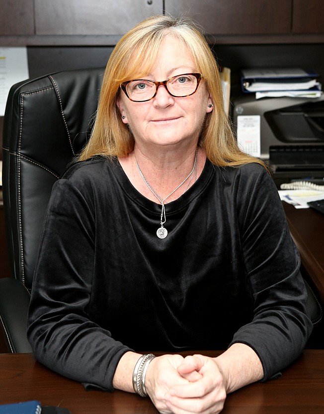  Helen Diggs, executive director of Rand Sams' Outreach Shelter, poses for a portrait Friday in her Texarkana, Texas, office.