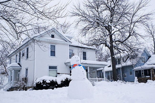 This towering snowman stands at the corner of 8th and Nichols streets in Fulton. Stop by to see it soon — the National Weather Service predicts highs above freezing until Saturday.