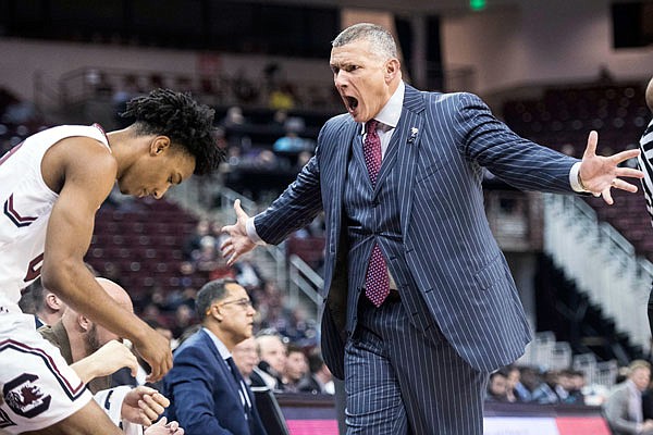 South Carolina coach Frank Martin yells at A.J. Lawson during last week's game against Mississippi State in Columbia, S.C.
