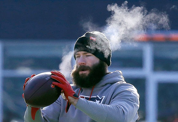 Patriots wide receiver Julian Edelman warms up before last Sunday's game against the Chargers in Foxborough, Mass.