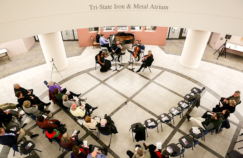 The Emerald Quartet performs for an audience Monday at the Tri-State Iron and Metal Atrium at the University Center of Texas A&M University-Texarkana. The quartet performed Alexander Borodin's "String Quartet No. 2" in D Major and César Franck's "Piano Quintet" in F Minor. 
