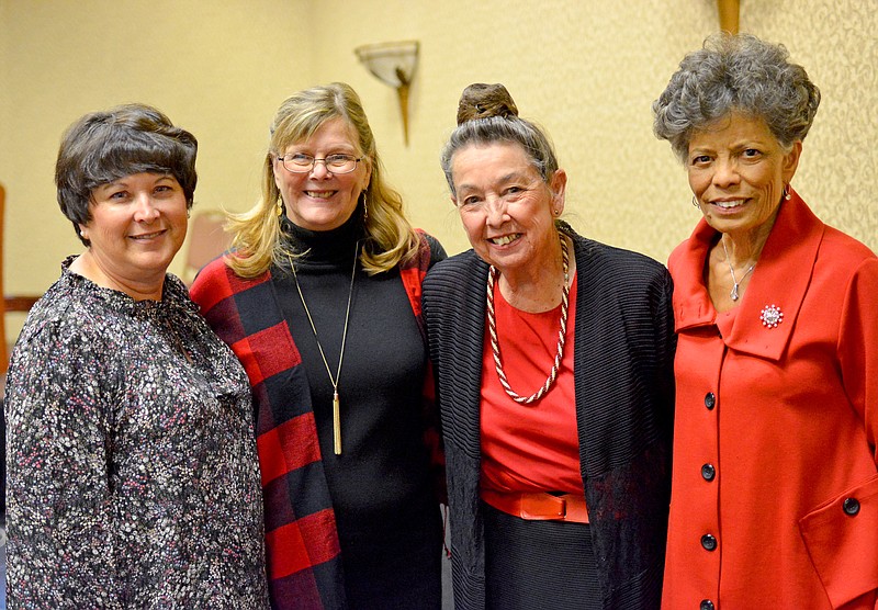 Sally Ince/ News Tribune
From left, Becky Schlueter, Tina Sellner, Gala Miller and Vivki Myers stand together October 25, 2018 as they end the Jefferson City Council of Clubs Fall Fashion Show at Capitol Plaza Hotel. The final fundraiser ended on a high note raising enough money to donate $2,500 to both The Dental Mid Eye and Shoe Program and the Food Bank for Central & Northeast Missouri.