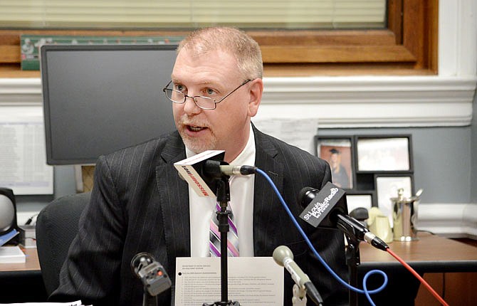 Missouri state Budget Director Dan Haug answers questions from the media Wednesday, Jan. 16, 2019, during a press conference at his office in the state Capitol. 