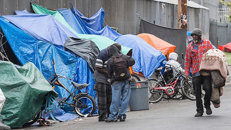 Homeless people set up tarps and tents in downtown Los Angeles in May 2016. (Brian van der Brug/Los Angeles Times/TNS)