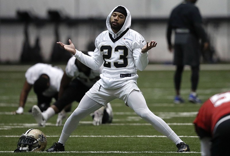 New Orleans Saints cornerback Marshon Lattimore (23) dances to music while stretching during practice at their NFL football training facility in Metairie, La., Thursday, Jan. 17, 2019. The Saints will host the Los Angeles Rams for the NFC Championship on Sunday, Jan. 20, 2019. (AP Photo/Gerald Herbert)