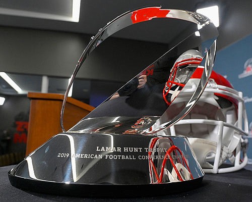 The Lamar Hunt Trophy, awarded to the AFC champion, is displayed during a news conference Wednesday at Arrowhead Stadium.