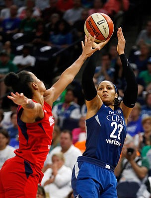 Maya Moore of the Lynx puts up a shot during a WNBA game against the Mystics last season in Minneapolis.
