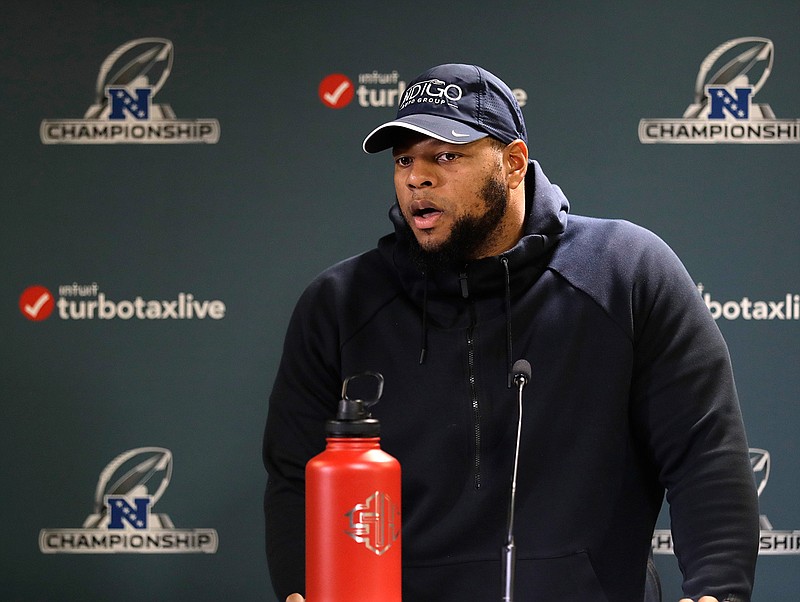Los Angeles Rams defensive tackle Ndamukong Suh addresses the media during an NFL football press conference Wednesday, Jan. 16, 2019, in Thousand Oaks, Calif. The Rams face the New Orleans Saints in the NFC Championship on Sunday. (AP Photo/Marcio Jose Sanchez)
