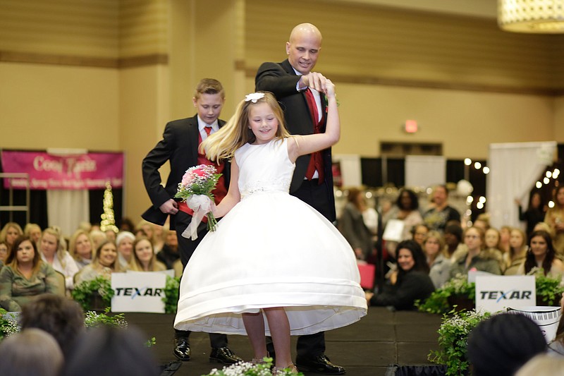 The 2019 Texarkana Bridal Fair was held at the Texarkana Convention Center.  Prospective brides were able to meet with industry professionals, shop at booths set up by local companies and national chains, and were treated to a fashion show featuring gowns, dresses and tuxedos from various designers. (Photo by Stan Shavers)
