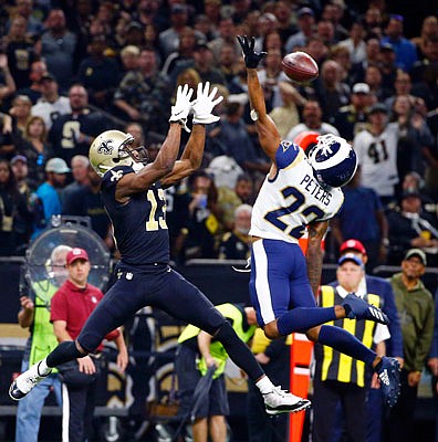 Rams cornerback Marcus Peters breaks up a pass intended for Saints wide receiver Michael Thomas during a regular-season game in November in New Orleans.