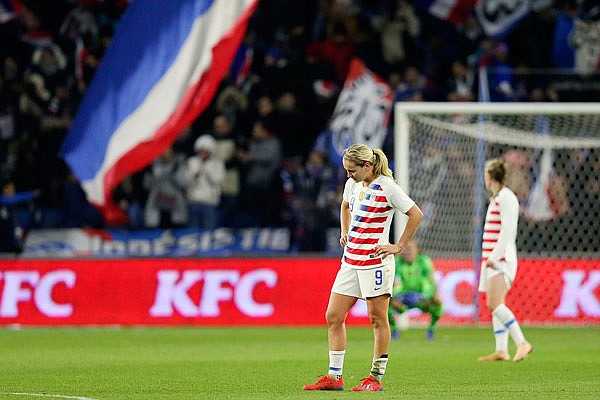 U.S. midfielder Lindsey Horan stands on the pitch after France scored its third goal during a women's international friendly Saturday against France in Le Havre, France.