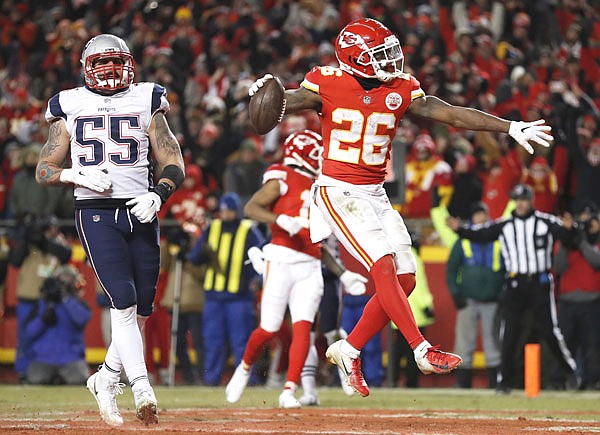 Chiefs running back Damien Williams celebrates a touchdown during the second half of Sunday night's AFC championship game against the Patriots at Arrowhead Stadium.
