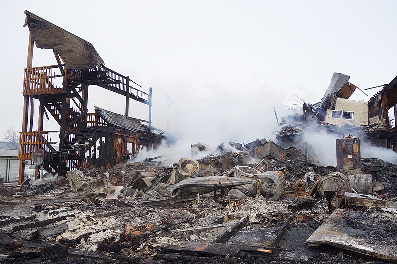 Helen Wilbers/FULTON SUN While several exterior walls still stand, Evergreen Apartments' interior is a heap of rubble following a fire the morning of Jan. 21 in Holts Summit. The building contained 30 units, all of which were occupied.