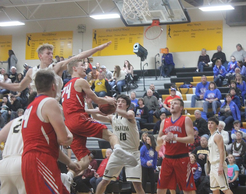 <p>Democrat photo/ Kevin Labotka</p><p>Jordon Geiser drives to the hoop during California’s 83-76 win over Versailles, Jan. 18.</p>