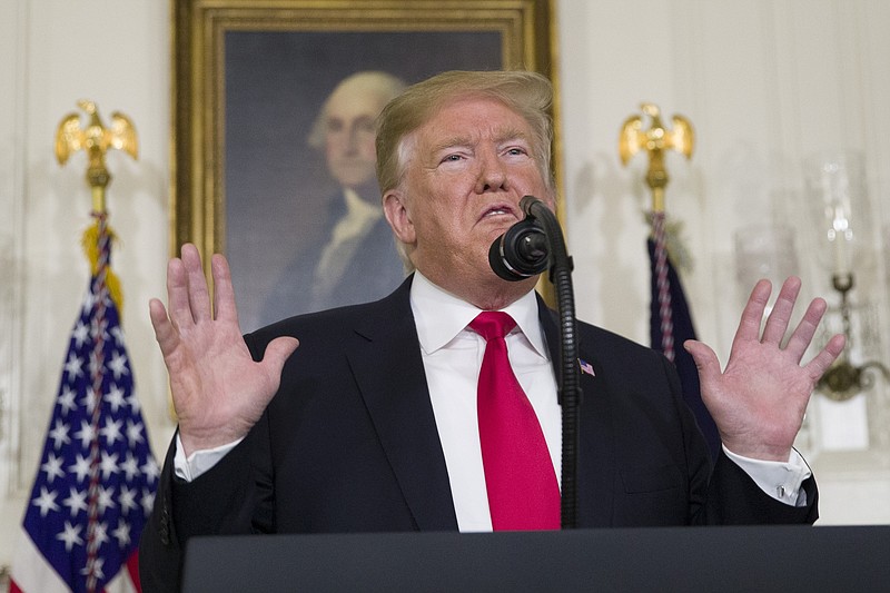 President Donald Trump speaks about the partial government shutdown, immigration and border security in the Diplomatic Reception Room of the White House, in Washington, Saturday, Jan. 19, 2019.(AP Photo/Alex Brandon)