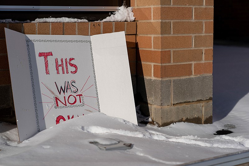  A sign reading "This was not okay," is seen in front of Covington Catholic High School on Sunday in Park Kills, Ky., S. A diocese in Kentucky has apologized after videos emerged showing students from the Catholic boys' high school mocking Native Americans outside the Lincoln Memorial on Friday after a rally in Washington. 