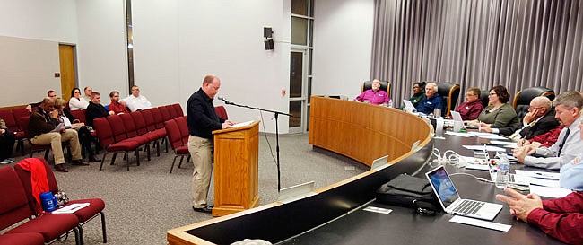 Fulton firefighter Scott Peterson speaks to the City Council on Tuesday about approval of a negotiated agreement that would provide firefighters with a union contract. The last contract expired in 2013.