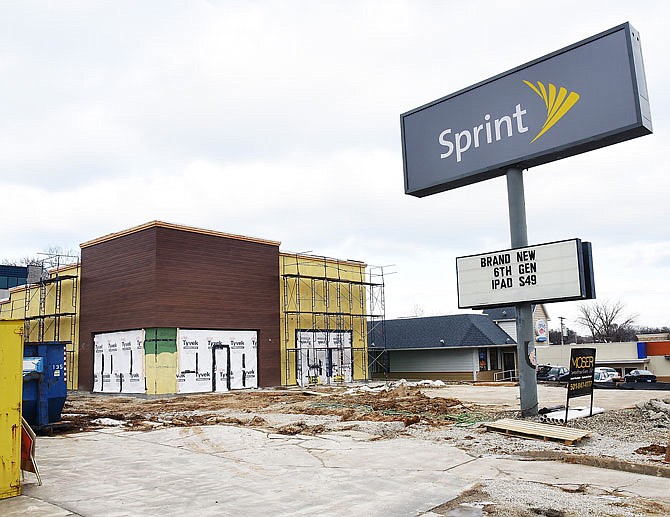 Construction is seen in the 2100 block of Missouri Boulevard at a Sprint cellular store. This is just one of the numerous commercial building permits issued by Jefferson City in 2018.